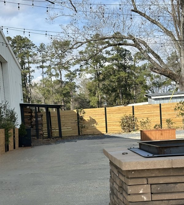 Patio lounge under skylights with seating & 2 stone fire pits